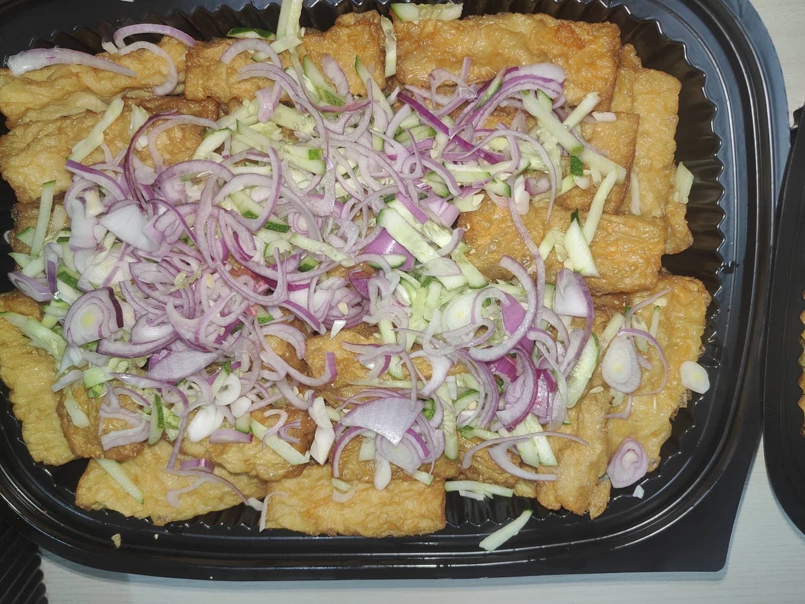 Braised tofu with onion tray
